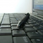 Pen over Laptop keyboard