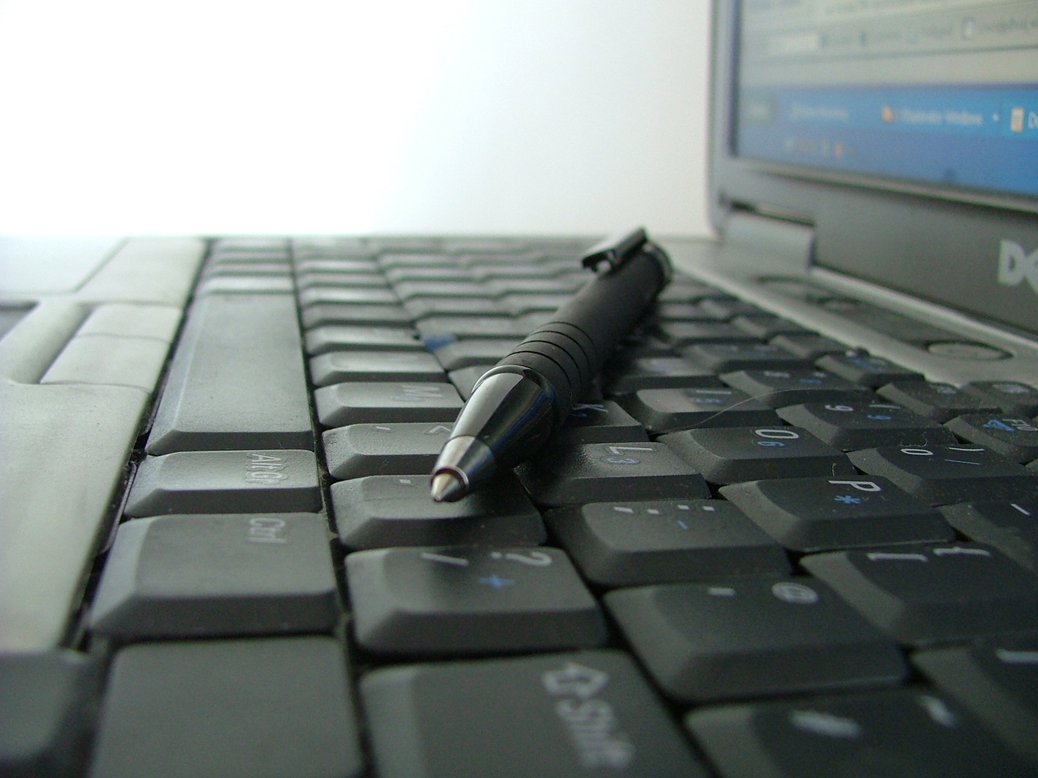 Pen over Laptop keyboard
