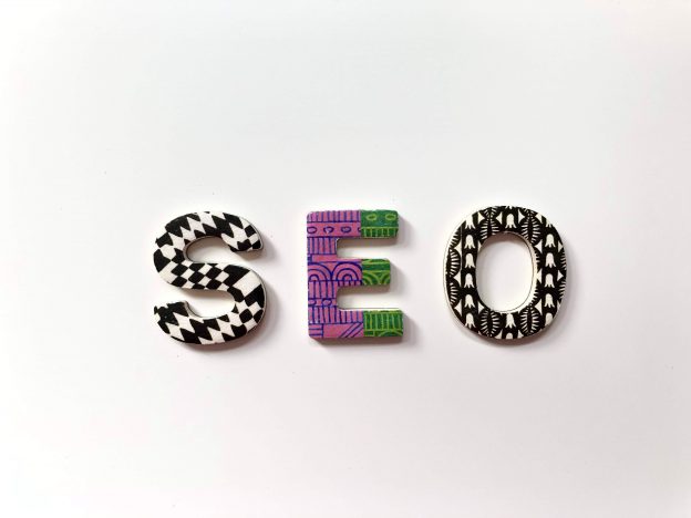 strangely colored letters spell out seo