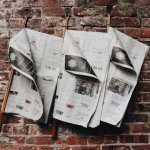 Newspaper hanged over wall