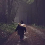 Girl Walking in Forest road