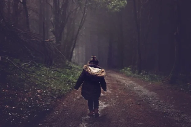 Girl Walking in Forest road