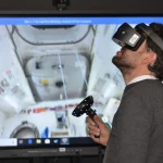 Man with Virtual Reality Device