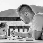 Dad and girl drawing